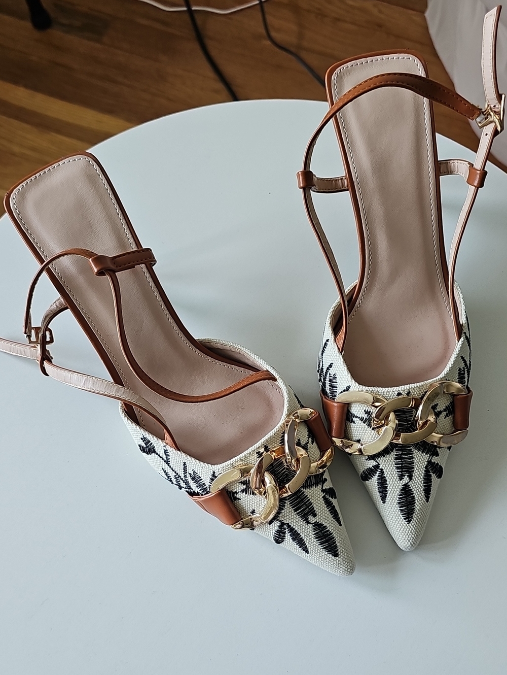 Embroidered Cream Slingback Heels with Brown Trim and Gold Chain
